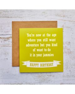 AT THE AGE JAMMIES BIRTHDAY HUMOUR CARD GREEN WITH BANNER